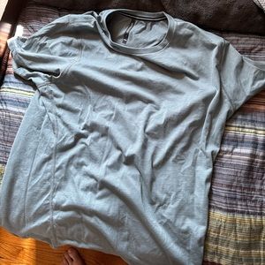 Light weight ten thousand blue training shirt.